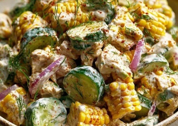 Street Corn Creamy Cucumber Chicken Salad in a bowl with fresh ingredients